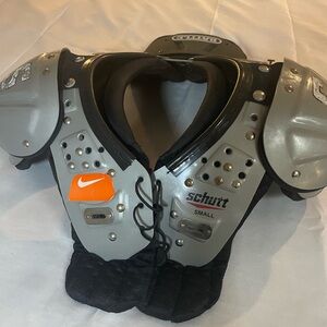 Schutt youth small football pads with battle back plate